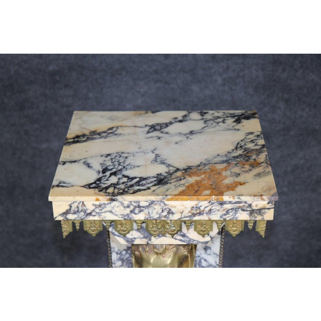 This exceptional bronze-mounted Brèche d'Alep (often referred to in the antiques trade as Brèche Violette) marble pedestal...