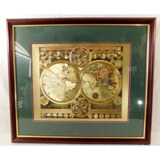 Beautiful large vintage circa 1980s ornate gold world map print. Framed and matted in a beautiful forest green with gold...