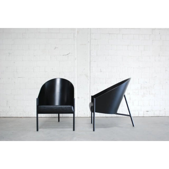 This set of two armchairs model Pratfall by Philippe Starck was manufactured by Driade Aleph. The chairs feature black...