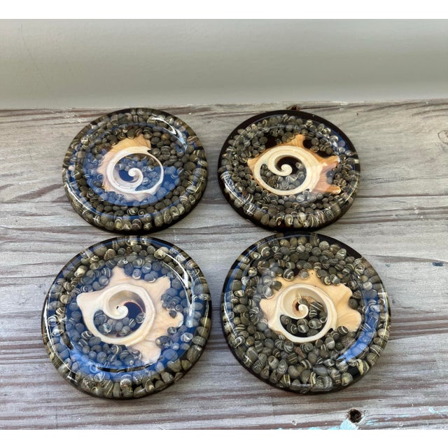 1960s Beachy Keen Abalone Shell and Resin cork backed coasters. Perfect for boho, coastal, and mid-century aesthetics.