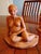 This is a rare, artist-signed pair of handmade studio art terracotta sculptures capturing the beautiful chronological...