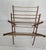 This antique free standing, collapsable drying rack features a wood frame and slender wooden bars. It has a beautiful and...