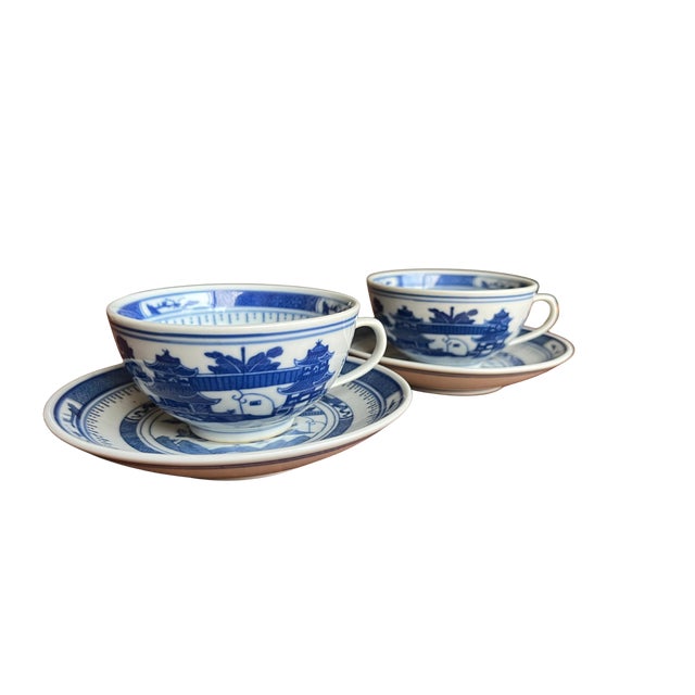 Jingdezhen Zhi Blue & White Pagoda Porcelain Tea Cups & Saucers (Set of 4) Classic blue-and-white porcelain tea service...