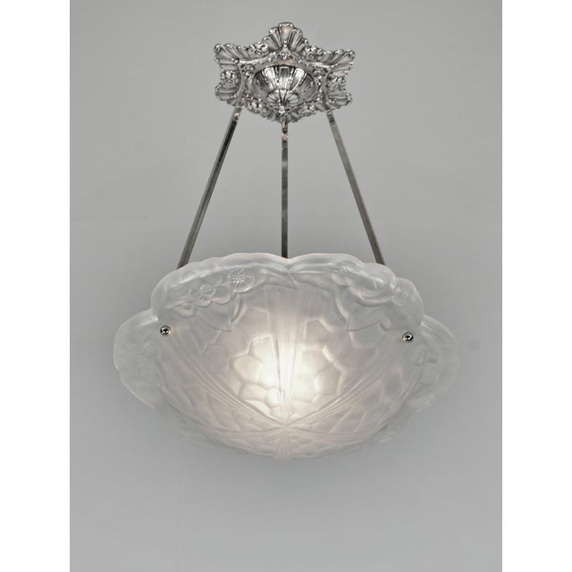 Degué A nickel-plated bronze or solid brass French art deco pendant light made around 1930. It holds a nice bowl by Degué...