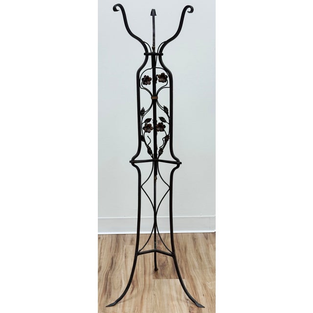 Vintage Art Nouveau style wrought iron stand with elaborate rose vine and leaf motifs. Bronzed finish. Ideal with plant...