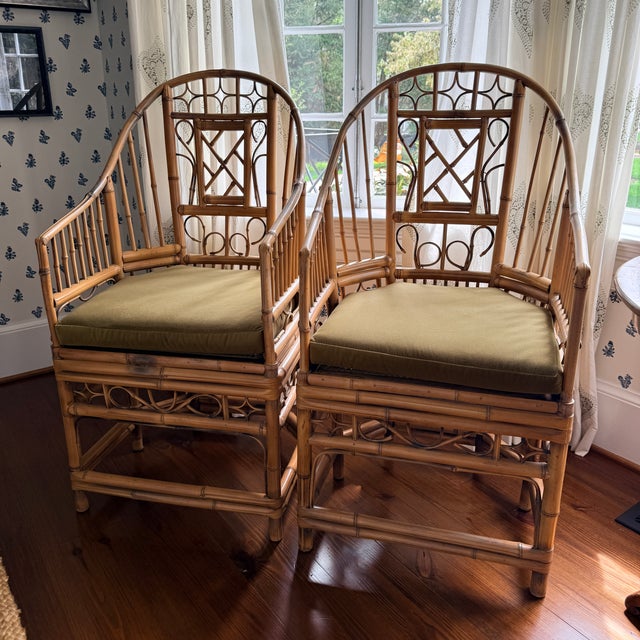 Pair Vintage Bamboo Brighton Pavilion Chairs We love the personality of this vintage pair of bamboo arm chairs. The bamboo...