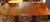Early 20th century Georgian style double pedestal banquet dining table, English. Mahogany. Reeded edge. Raised on gun-...