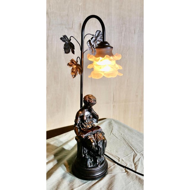 French Figural Bronze Lamp with a Lady Reading This charming piece has a good colour, the lovely lady is sitting beneath...