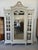 large French louis XVI 3 door bookcase or Armoire made of solid walnut. The wood has the original French paint from the...