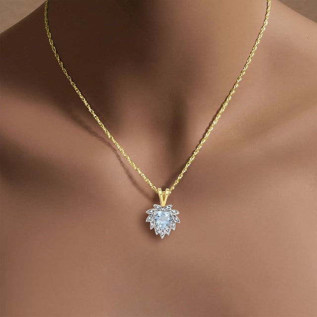 ♥ Pendant Summary ♥ Main Stone: Aquamarine & Diamond Approx. Aquamarine Carat Weight: .63ct Material: 14K Yellow Gold...