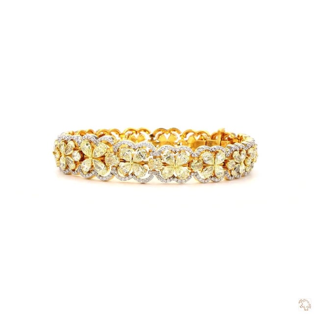 This statement bracelet from our contemporary estate collection centers on a 1.67-carat diamond in a round brilliant cut...