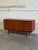 This minimalist sideboard combines clean lines with functional Scandinavian design heritage. The left side features a...