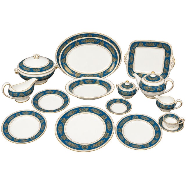 A truly impressive collection of Wedgwood Columbia Blue fine bone china, featuring an elegant deep blue border with...