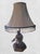 A whimsical and fun vintage monkey table lamp with striped shade. The lamp is extremely heavy, made of some sort of...
