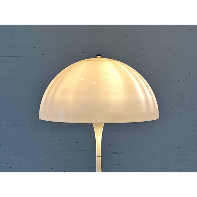 Iconic table lamp from the panthella series, designed in 1971 by danish designer verner panton for lighting manufacturer...