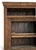 The dense geometric trim, patterned friezes, and rosette motif styling along the outer border are characteristic of...