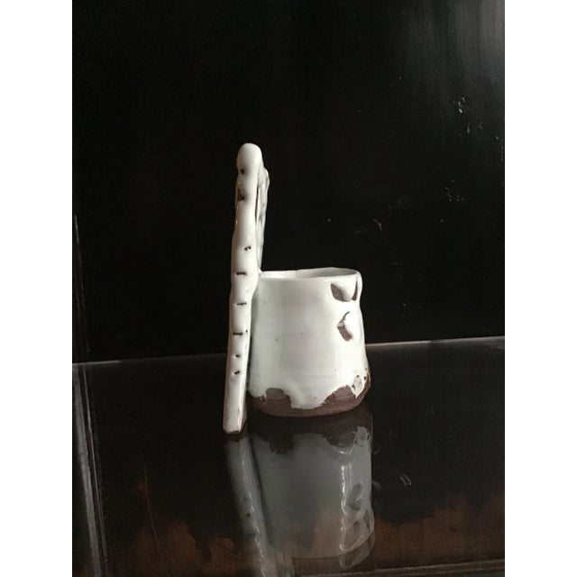 A traditional Hagi ware ceramic work with signature thickly applied glaze. Drawing on the principles of wabi sabi and...