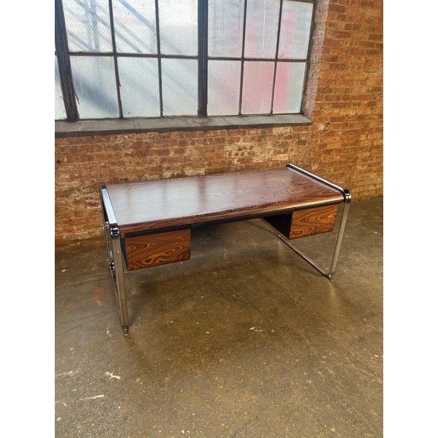 Iconic zebrawood desk attributed to by Peter Protzman for Herman Miller as part of the Tubular Collection, produced from...