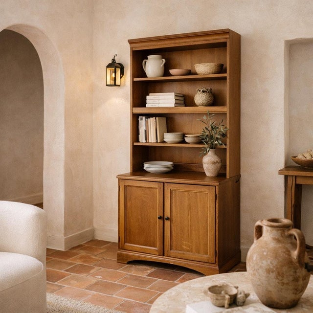 Late 20th-century oak hutch cabinet by Hooker Furniture with open display shelving, a generous work surface, and concealed...