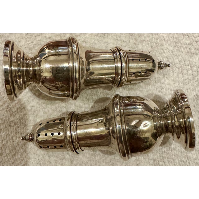 Beautiful pair of Revere sterling silver salt & pepper shakers. Produced in the USA during the 1940’s and 1950’s. There...