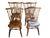 A beautifully collected set of four vintage Windsor dining chairs in a warm Nutmeg finish, consisting of two original...