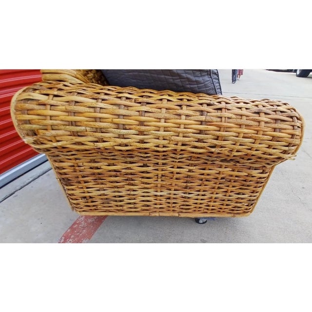 Woven Rattan Sofa with Floral Cushions by Polo Ralph Lauren Chairish