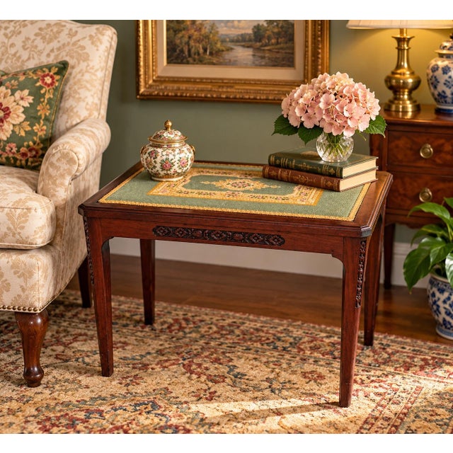 Charming vintage carved wood bench / accent table featuring an elegant floral needlepoint upholstered top and beautifully...