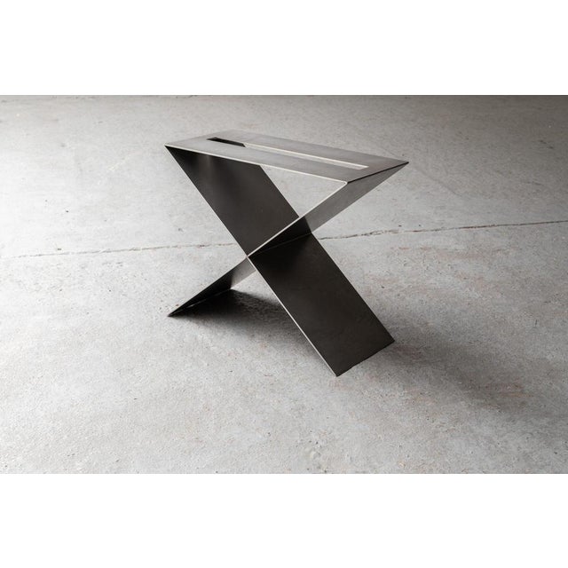 This stainless steel side table is a contemporary design by Lena Coupez, produced locally by hand by local craftsmen in...