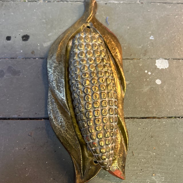 1970’s brass corn on the cob door knocker. Measures about 3.5x9. Made in Mexico. Check out my shop Robins Egg Gallery for...