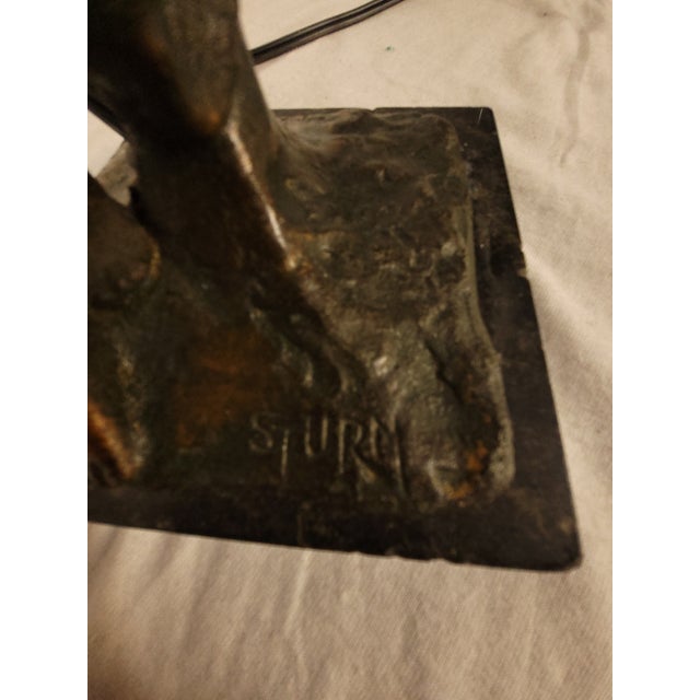 This art nouveau style night lamp comes from Germany sometime between 1900-1910. The piece is titled Sturm by designer and...