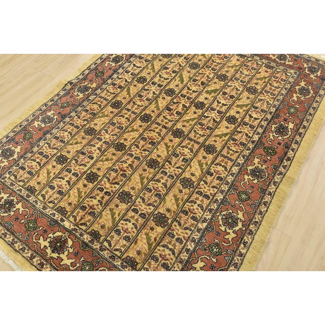 An authentic vintage traditional Gabbeh rug hand-knotted with fine wool and natural dyes. This oriental rug features rows...