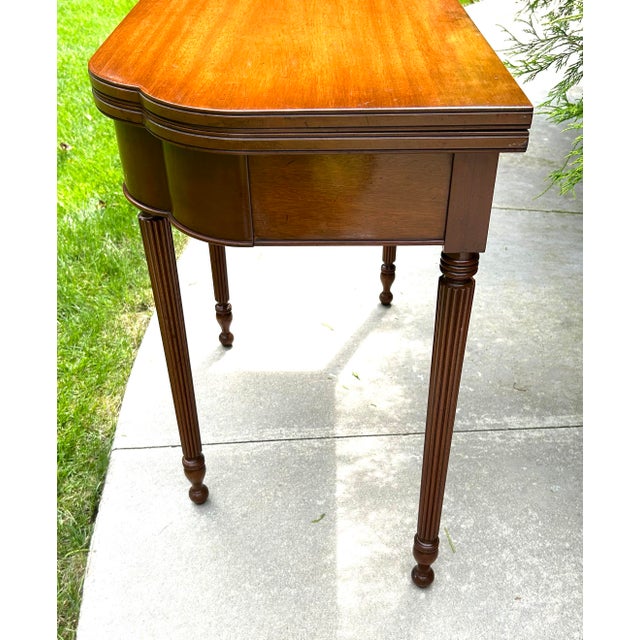 1950s Biggs Furniture, Mahogany, Sheraton Style, Swivel and Hinged Flip Top Mechanism, Game Table, W/Hidden Drawer, Scalloped Edges, and Fluted Legs, 1950 For Sale - Image 5 of 12
