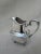 This silver plated pitcher has the traditional Daffodil pattern by Rogers Brothers. This is a very sturdy well made...