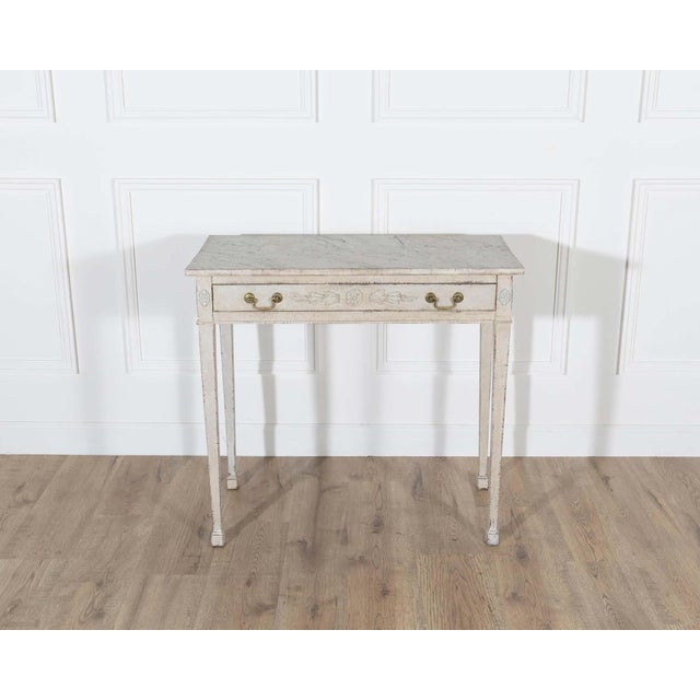This refined Danish console table, dating to circa 1820, is an exquisite example of early 19th-century neoclassical...