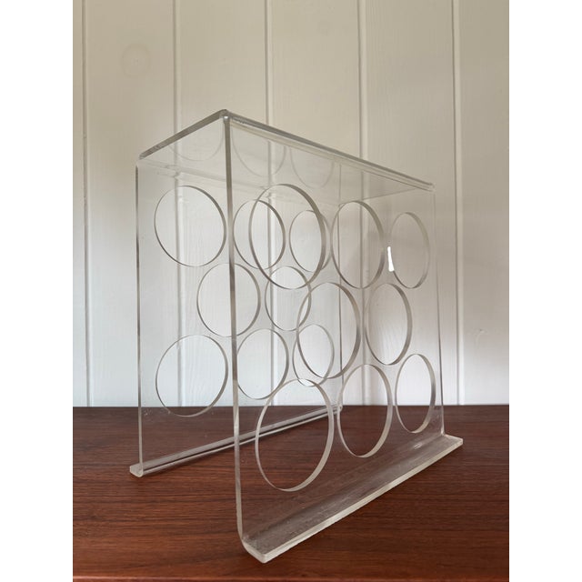 Vintage lucite wine rack. Holds 8 bottles with class.