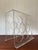 Vintage lucite wine rack. Holds 8 bottles with class.