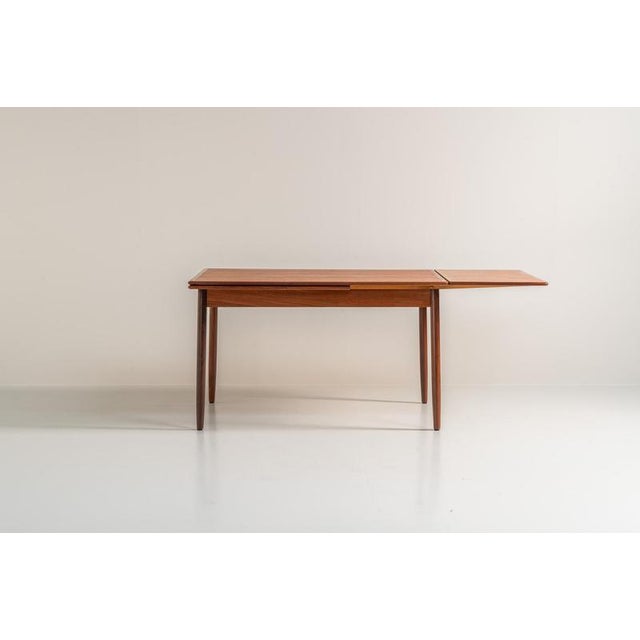 Danish extendable dining table, 1960s. A beautiful Danish extendable dining table that can easily be extended from 126 cm...
