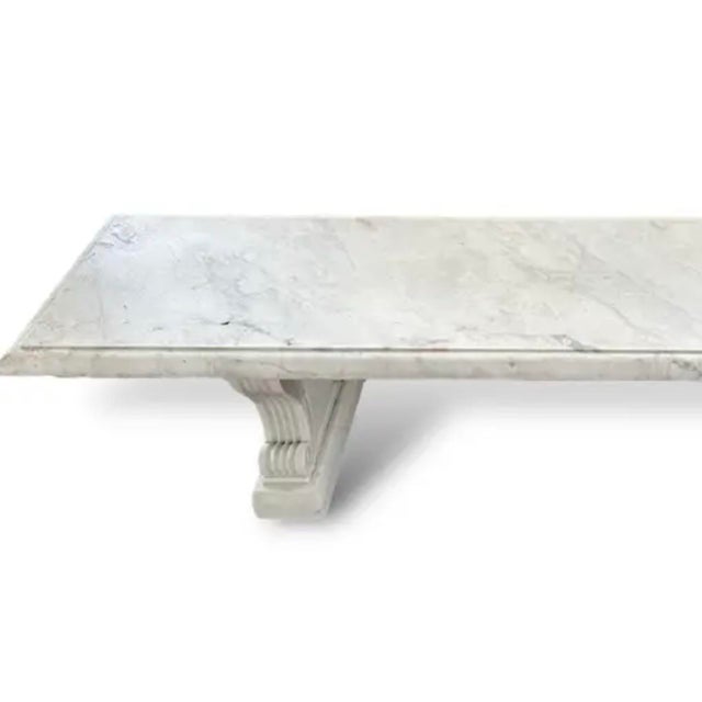 An exceptional vintage Italian Neoclassical bench handcrafted from premium, fine-veined white marble. Sourced from a...