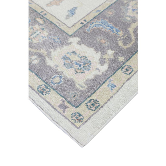 Turkish Oushak Rug Gray & Soft Blue Handwoven Wool Rug 6'1" x 8'10" This Turkish Oushak rug is crafted from handwoven wool...
