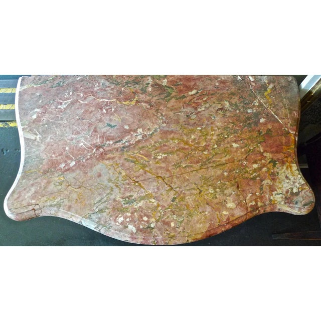 Here we have a 3 drawer xix French burl walnut commode. There is a marble top and has the original hardware. However there...