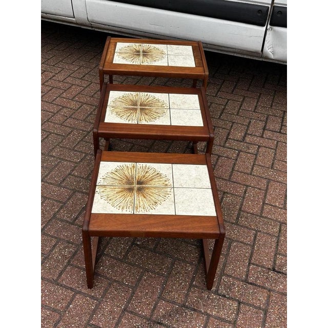 G-Plan Mid Century Nest Of Tables. Size as closed unit:- 59cms x 48 cms, 47 cms tall. Strong and solid, the tables are in...