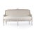 The Yvon Bench from Zentique is a French Louis XVI canapé-style bench with a carved arched back, scrolled arms, off-white...