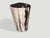 "Beautiful beige and black tones on this minimalist ancient high quality petrified wood side table. It’s fascinating how...