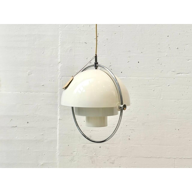 Iconic scandinavian pendant lamp from the multi-lite design series by louis weisdorf, manufactured by lyfa in denmark. The...