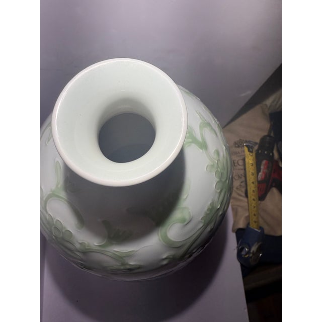 There is an unmistakable presence to grand-scale porcelain, and this spectacular double-gourd floor vase commands...