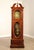 Custom Quality Carved and Inlaid Mahogany Tall Case Clock with Brass Weights and Pendulum Behind Beveled Glass Door, Moon...