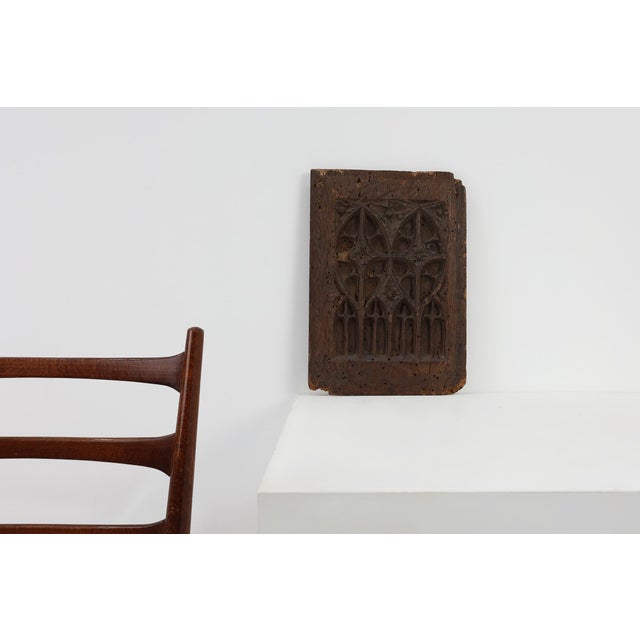 A rare fragment of late Gothic craftsmanship from 15th‑century France, this carved oak panel reveals the architectural...