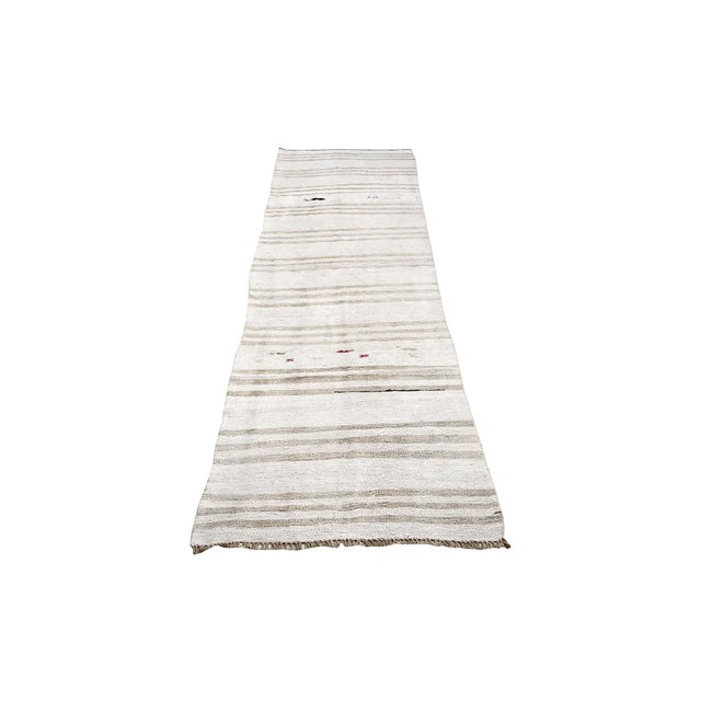 Handwoven vintage hemp kilim rug from Yozgat region of Turkey. Approximately 45-55 years old. In very good condition.