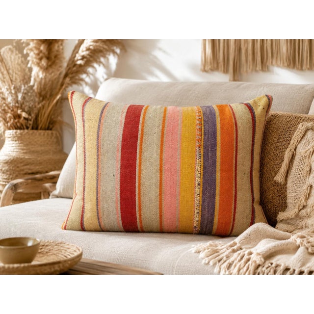 Add a touch of history and warmth to your space with this vintage handmade Turkish wool kilim cushion cover. Crafted from...