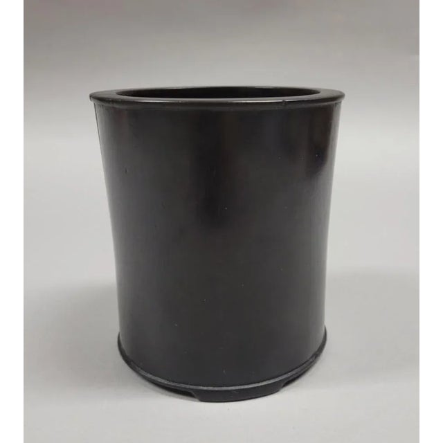 Late 19c Chinese Blackwood or possibly Zitan wood brush pot in the classic style with smooth sides and a raised ring at...